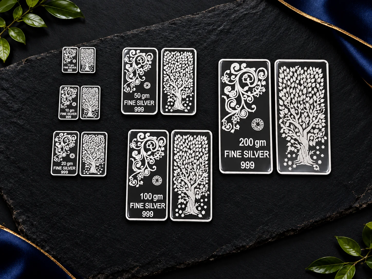 Rectangular silver bars feature detailed floral patterns and tree designs in contrasting black and silver finish.