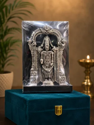 Oxidised silver plaque idol featuring intricate carvings and traditional arch design.