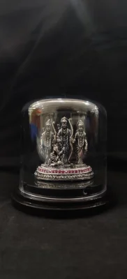 Oxidised silver Ram Darbar murti featuring detailed deity figures and a red stone border.
