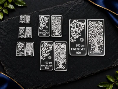 Rectangular silver bars feature detailed floral patterns and tree designs in contrasting black and silver finish.