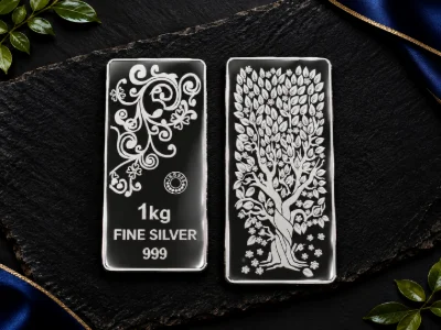 Rectangular silver bars feature an oxidised black finish with intricate floral vine and tree motifs.